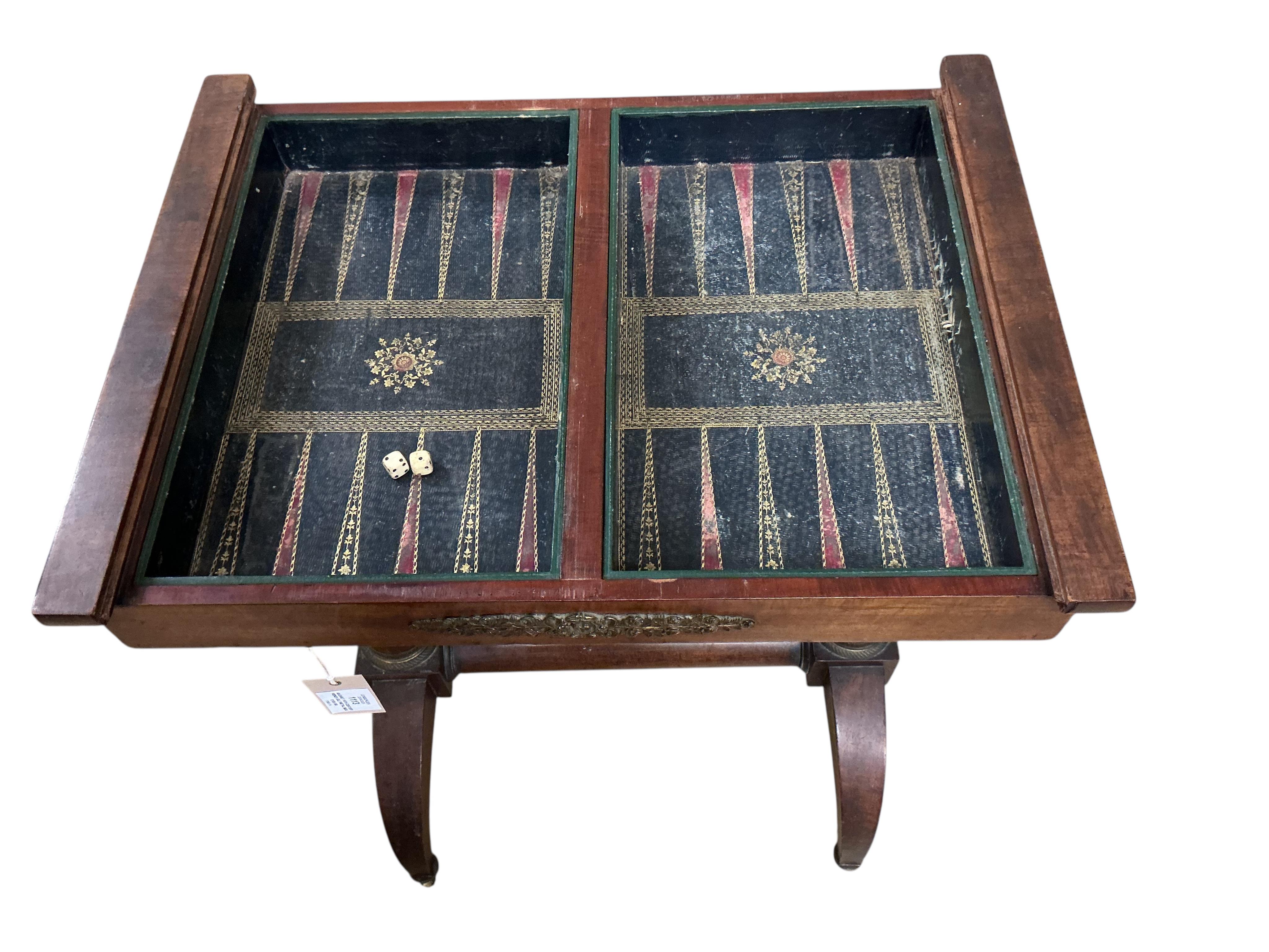 An early 19th century French gilt metal mounted mahogany games table, width 54cm, depth 41cm, height 70cm. Condition - fair